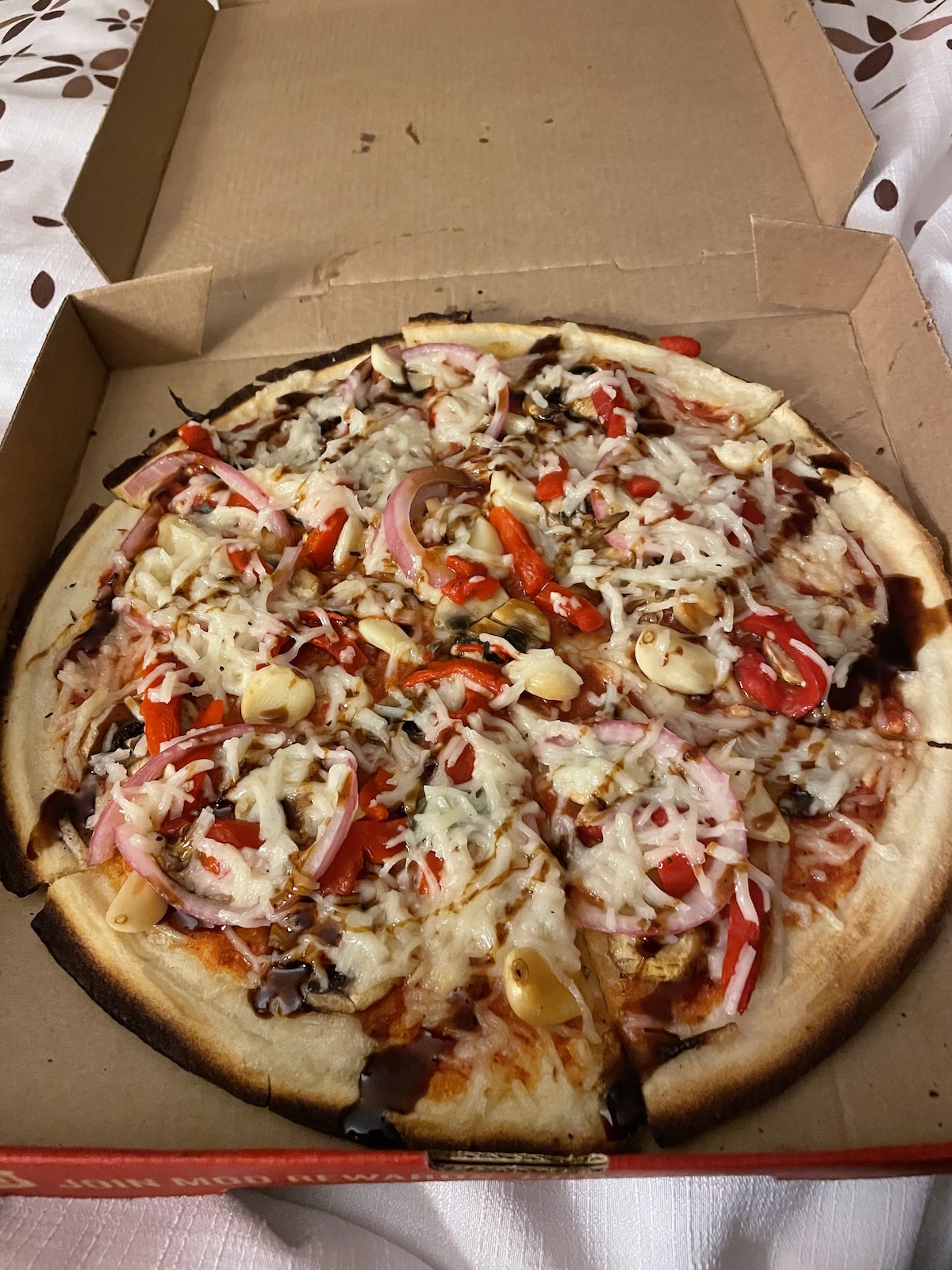 A vegan and gluten free pizza that the author eats before falling asleep.