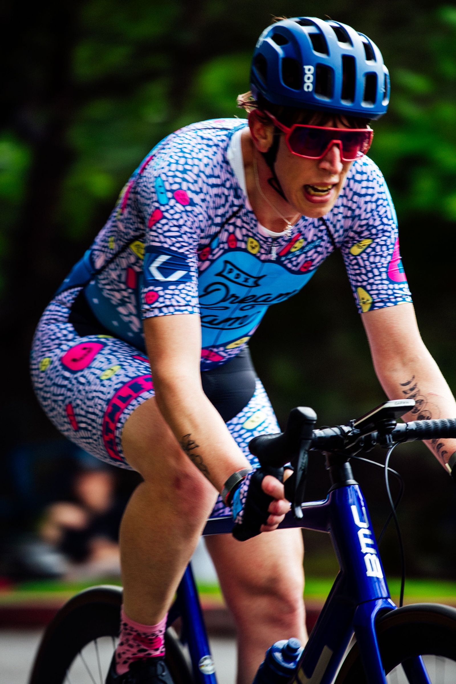 The author is captured racing up a hill, deeply focused, and trying to manage their breathing on a challenging hill course
